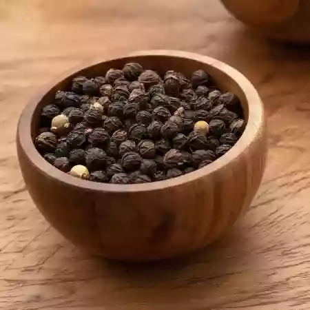 Whole black pepper from Kalpetta slopes, sun dried and graded in Kochi